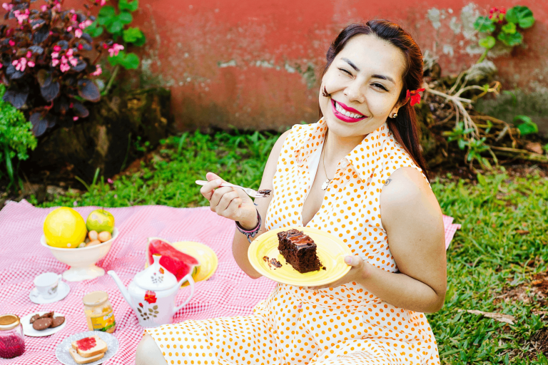 Woman eating nut-free chocolate cake